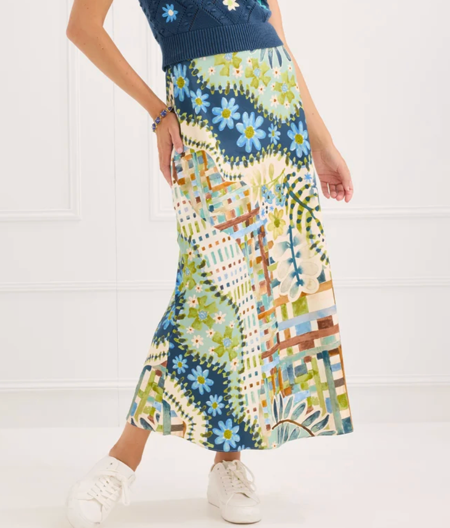 Alivia The Hillary Skirt in Mosaic Meadow, cropped side view detail of patchwork print and bias-cut drape