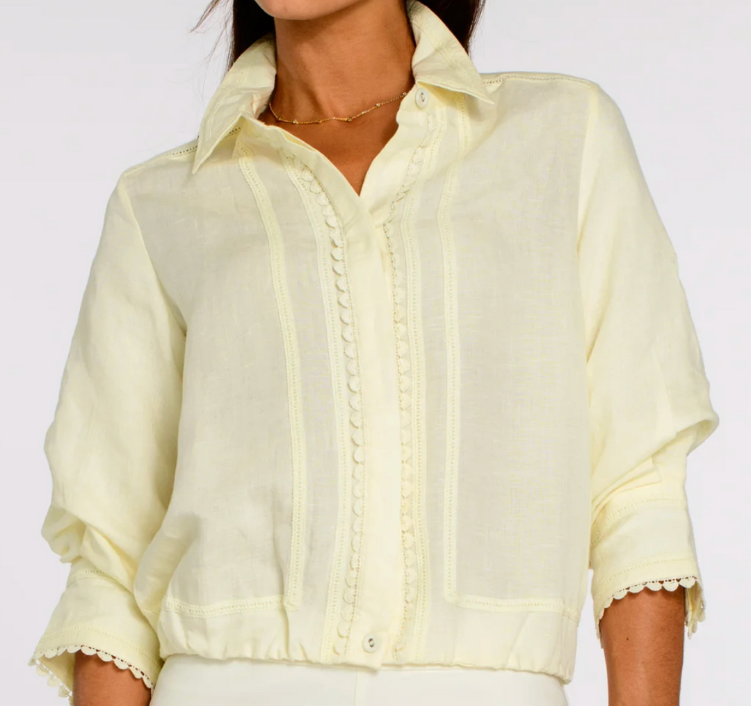 Vanilla sheer blouse jacket worn by a person on a white background
