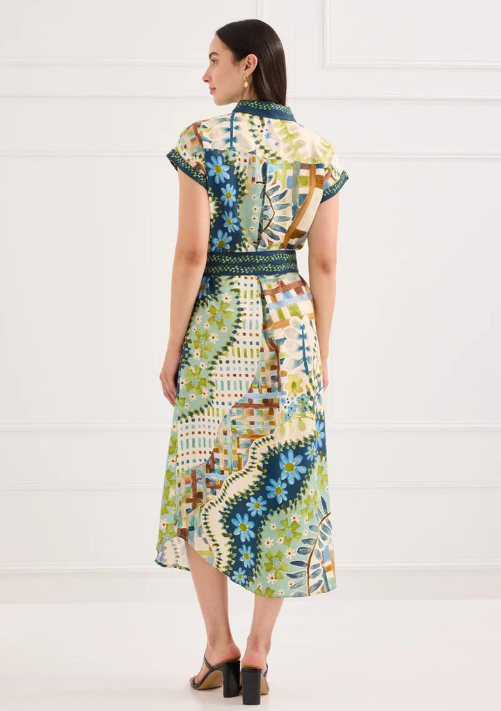 Alivia The Willa Dress in Mosaic Meadow, back view on-model, full-length showing belt and hem