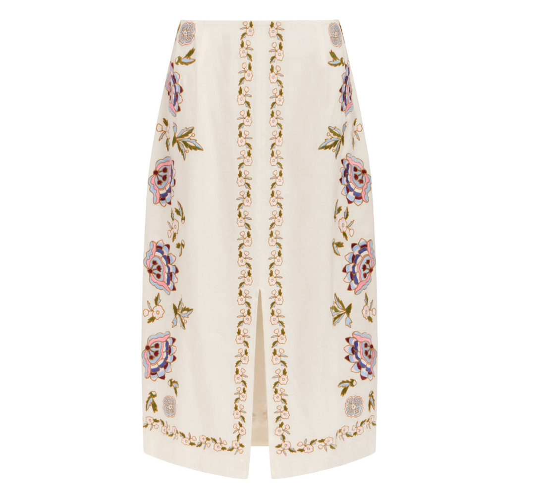 White skirt with floral embroidery on a white background