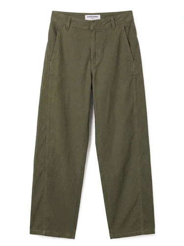Product flat-lay of the dark olive barrel-leg utility pant against a white background, showing the front waistband, pockets, and tapered leg shape.