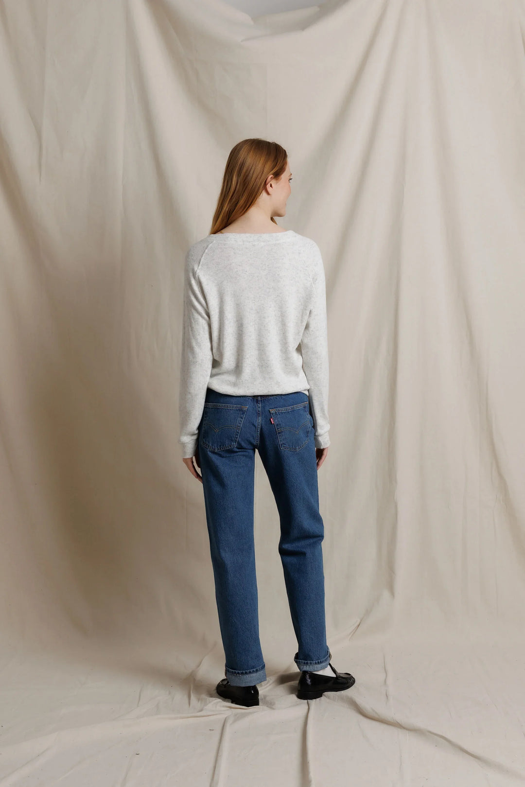 perfectwhitetee Brielle V Neck Sweatshirt in Ash, full-length back view on model, showing the raglan sleeves and relaxed fit, styled with cuffed straight-leg jeans and black loafers