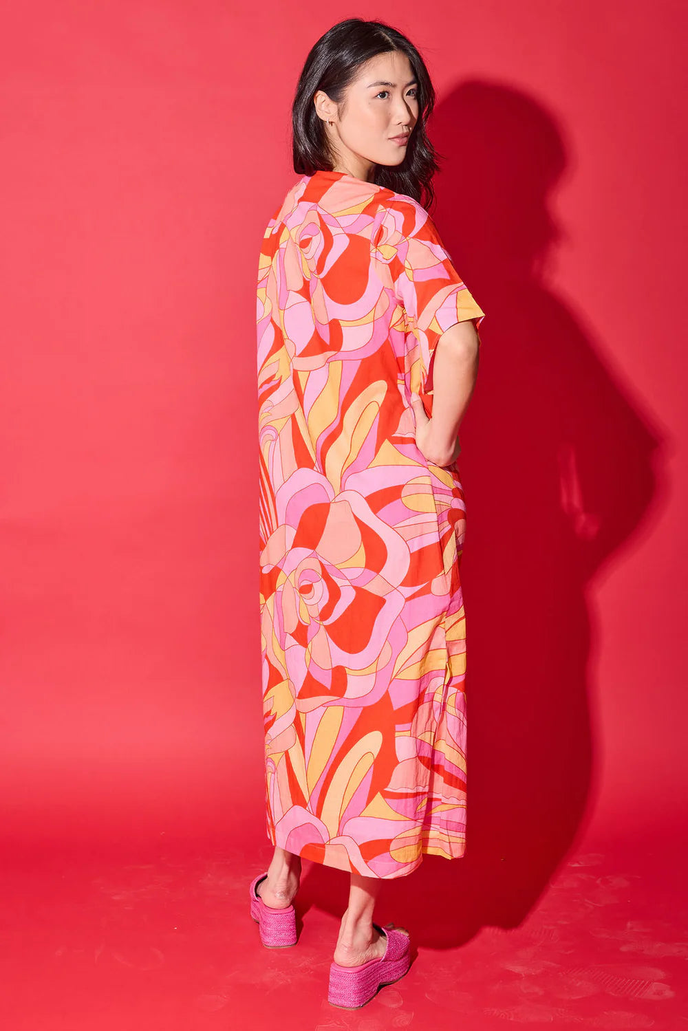 Back view of the Alden Adair Delaney Dress in Moroccan Poppy, showing the relaxed drape and hem length.