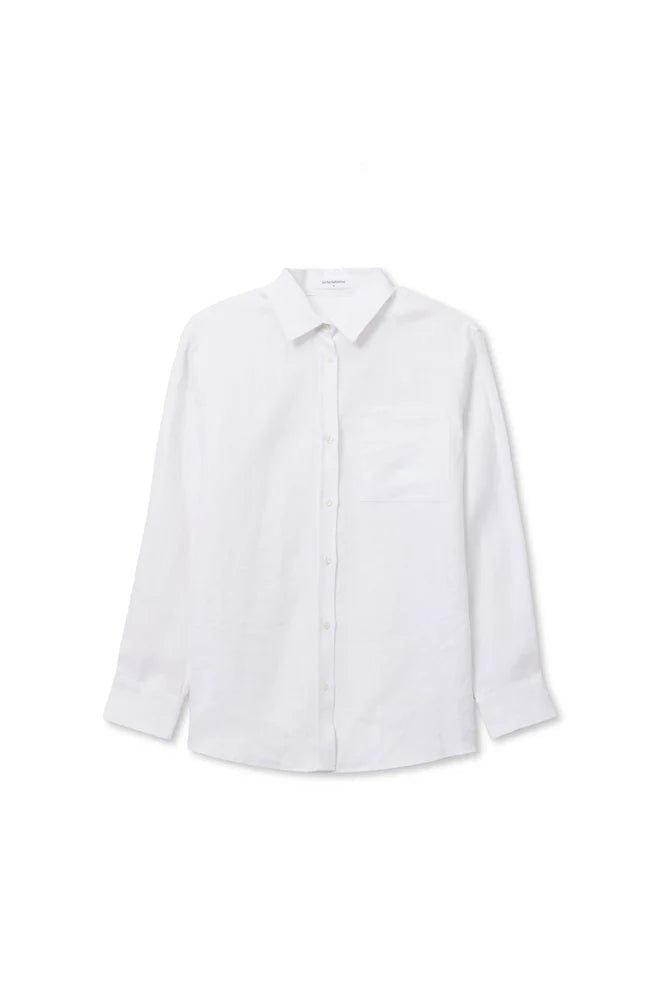 Perfectwhitetee Lorelai Linen Oversized Button-Down in white, styled open over matching linen shorts with black flat sandals, against draped cream backdrop.