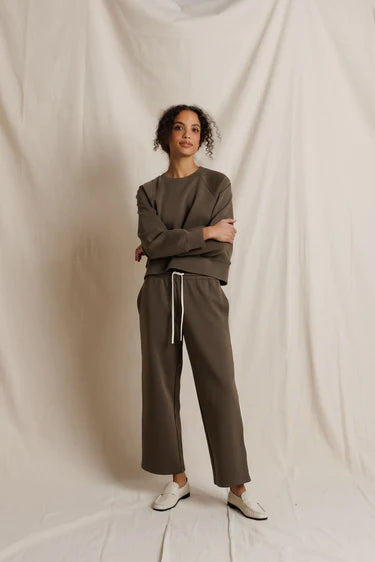 perfectwhitetee Claud Pureform Cropped Pant with Stripes in dark olive — front view styled with matching Nell sweatshirt