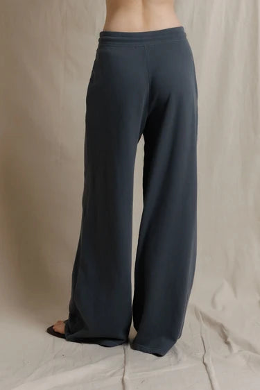 Back view of the pants showing the seaming and relaxed fit through the leg.