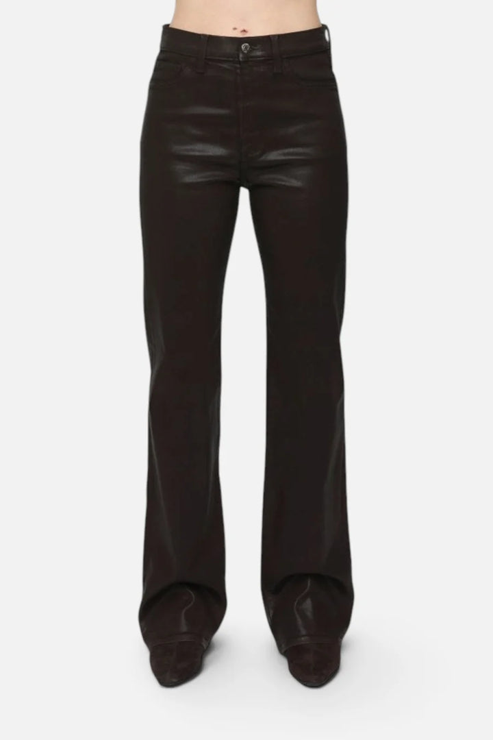 Pistola Evie High Rise Slim Boot in Coated Mocha, front view from the waist down, showing five-pocket styling, shank button, and coated sheen through the leg to the hem.