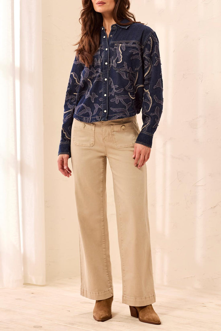 Tribal Sophia Curvy Super Straight Ankle in Light Suede, full-length front view on model, styled with a dark denim shirt with tonal appliqué and tan suede ankle boots.